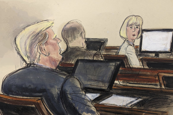 In this courtroom sketch, E. Gene Carroll, right, turns toward former President Donald Trump.