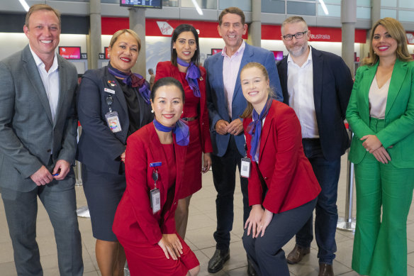 Then-acting Premier Steven Miles, Treasurer Cameron Dick and Virgin’s Alistair Hartley, with Tourism and Events Queensland chief Patricia O’Callaghan and crew members announce the cheap flights just this month.