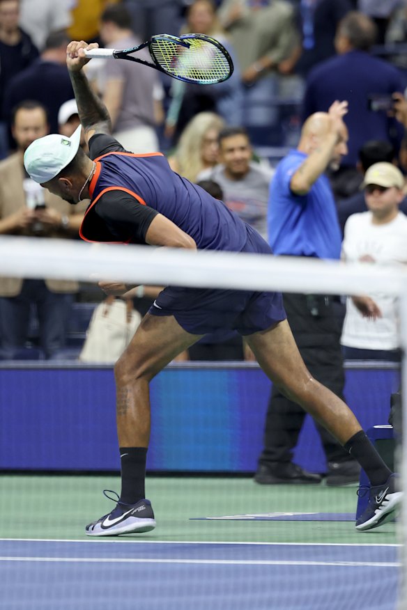 Nick Kyrgios smashes his racquet during his match against Karen Khachanov.