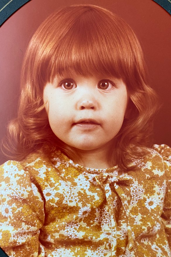 Megan in a dress made by her mum, 
a “gun” seamstress.