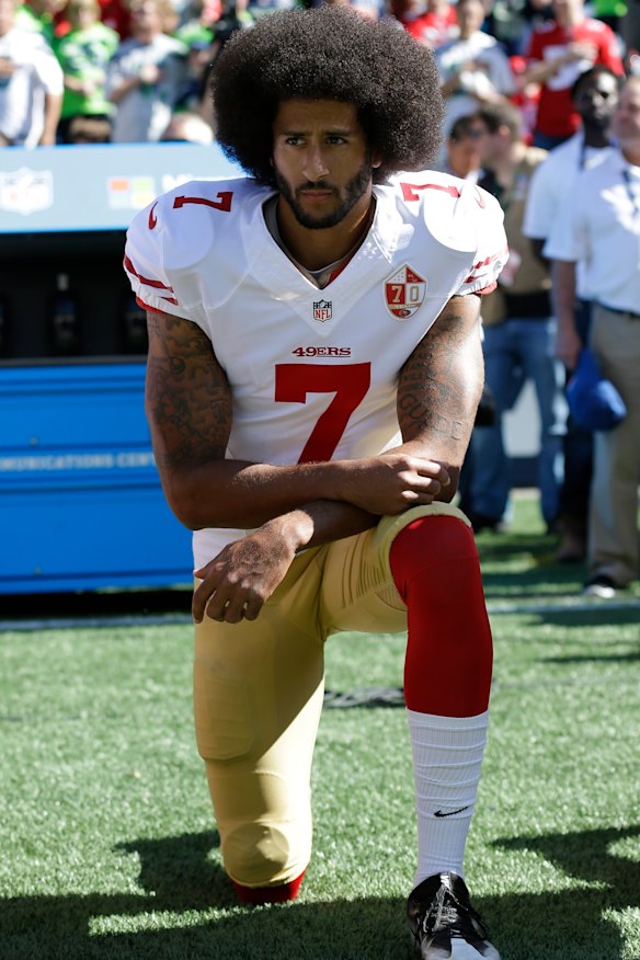 Lionised and vilified: The quarterback has paid a high price for his brave stance. 