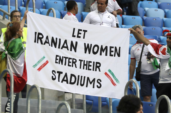 A banner calls for Iran to allow female supporters to attend local matches.