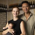 Owners Nicole Galloway and Peter Lew with newborn baby Louie.