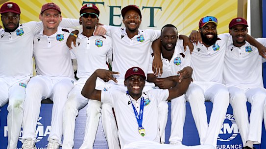 The West Indies celebrate after defeating Australia in Brisbane in 2024.