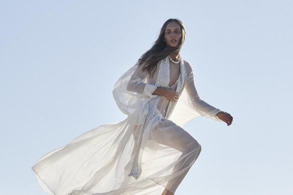Albus Lumen “Lucia” dress with crystal scarf, $2340. Paspaley “Delfni Blue” pearl choker, $16,800 (worn throughout).