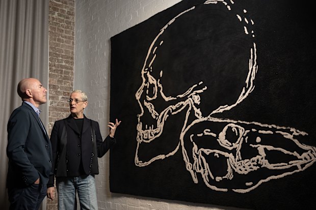 Art adviser Mark Hughes and art collector Sue Cato discuss an artwork by Shaun Gladwell.
