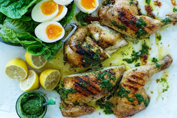 Barbecued chicken and eggs with herb butter.