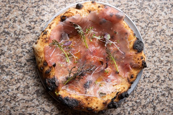 Tokyo bonito pizza with bechamel and tuna crudo.