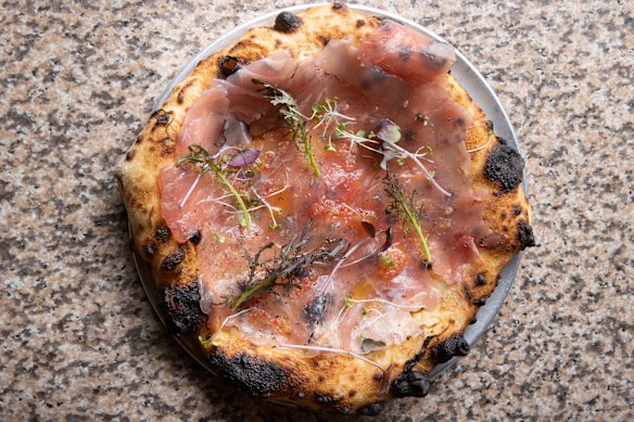 Tokyo bonito pizza with bechamel and tuna crudo.