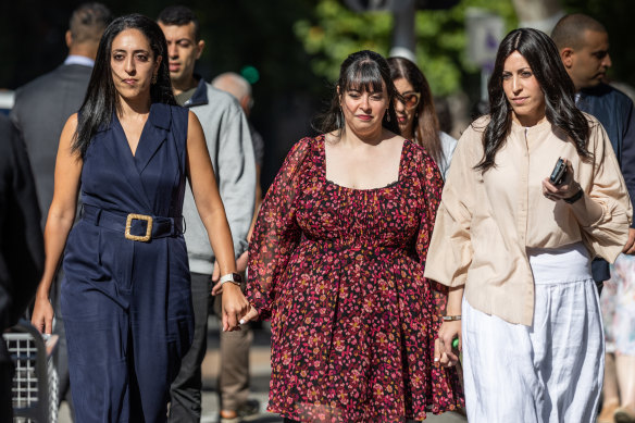 Elisheva (Elly) Sapper, Hadassa (Dassi) Erlich and Nehama (Nicole) Meyer arrive for a court hearing in Melbourne.