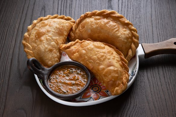 The fried cheese empanada.