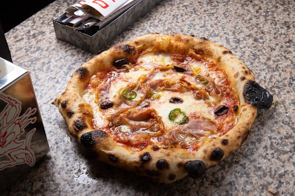 Garfield's Australiani pizza with pancetta, olives and chilli.