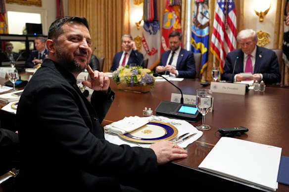 Ukraine’s President Volodymyr Zelenskyy sits before a meeting with President Donald Trump, from right, Vice President JD Vance and Treasury Secretary Scott Bessent in the Cabinet Room of the White House.