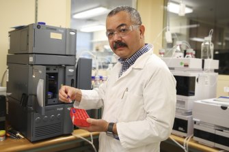Dr Tursun Kerim during testing of the AstraZeneca vaccine in one of the TGA’s laboratories.