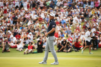 Matt Jones celebrates after holing a putt to win his second Australian Open in 2019, the last time the tournament has been played.