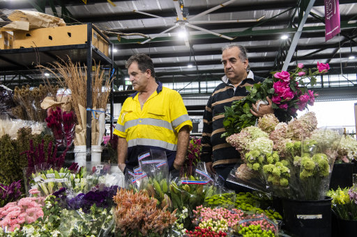 NSW Flower Growers Association secretary Sal Russo, right, with fellow grower, Lawrence Leoncino, who claims that he is owed money by florist Brennon Mrzyk.