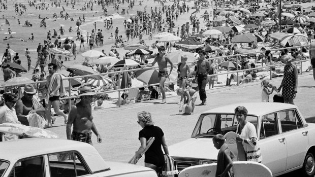 Bondi, 1970. Plenty of umbrellas but very little sunscreen. 
