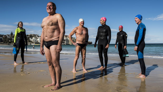 Bondi swimmers Paul Ure (front) with Melinda Selby, Chris Selby, Peter Kuner, Gavin Thomson, Daniel Martin at Bondi Beach.