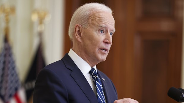 US President Joe Biden speaks during a news conference in the East Room of the White House in Washington, DC.