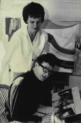 Artist Tom Gleghorn and his gallery director wife, Elise, in his studio in 1965.
