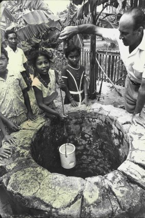 The Malayan village of Home Island with islanders and John Clunies-Ross (Photo by George Lipman/Fair