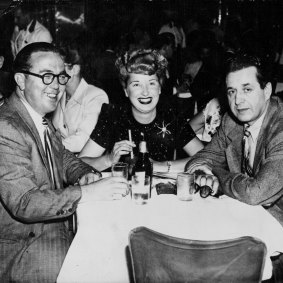 Entrepreneur Harry Wren, his wife, and American producer David Gould on December 12, 1956 