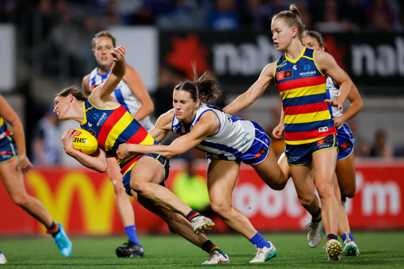 Adelaide’s Chelsea Randall can’t evade North’s Amy Smith.