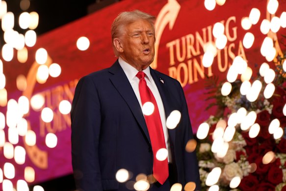 US President Donald Trump arrives to speak at a memorial for Charlie Kirk in Arizona on September 21.