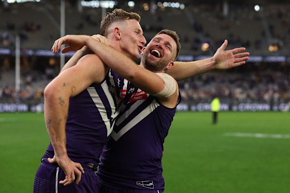 Dockers Josh Treacy and Luke Ryan celebrate after their win against the Hawks in May. 