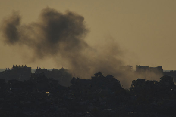 Smoke rises to the sky after an explosion in the Gaza Strip as seen from southern Israel on Sunday, 