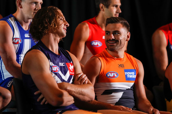 New Giants skipper Stephen Coniglio (right) with Dockers star Nat Fyfe.