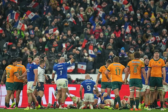 France players celebrate after Julien Marchand score.