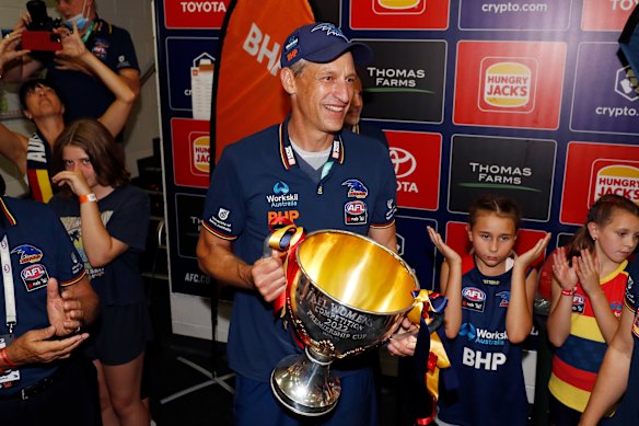 Adelaide coach Matthew Clarke with the 2022 AFLW premiership cup.