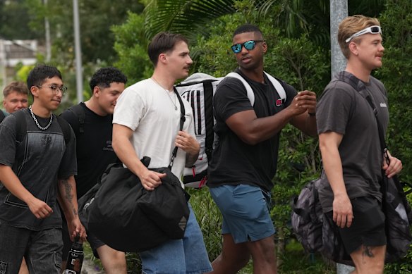 Crew members from the Lincoln arrive at a hotel in Pattaya. 