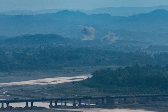 Smoke billows after an explosion in Jammu, India, on Saturday.