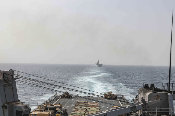 The amphibious dock landing ship USS Carter Hall and amphibious assault ship USS Bataan transit the Bab al-Mandeb strait in August.