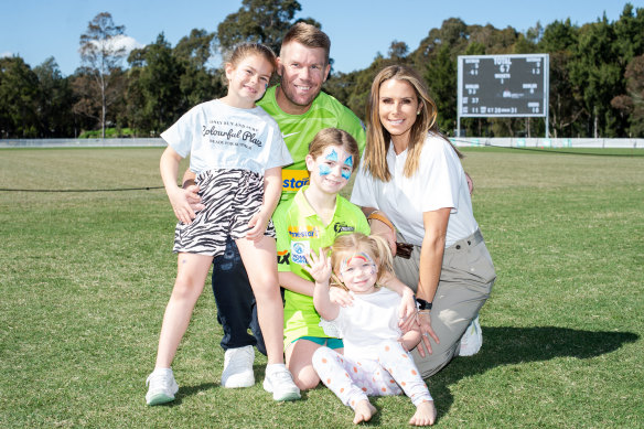David Warner with wife Candice and their children.