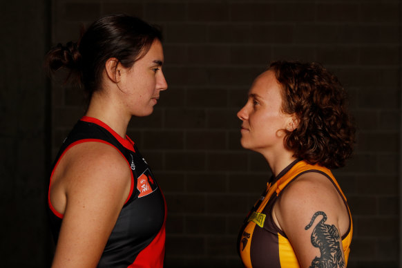Traditional men’s rivals, Essendon and Hawthorn, will now feature in the top women’s competition. Bonnie Toogood of the Bombers and Tilly Lucas-Rodd of the Hawks face off.