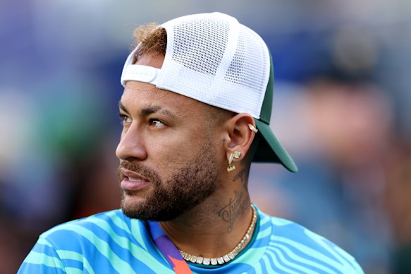 Neymar looks on before the match between Brazil and Morocco.