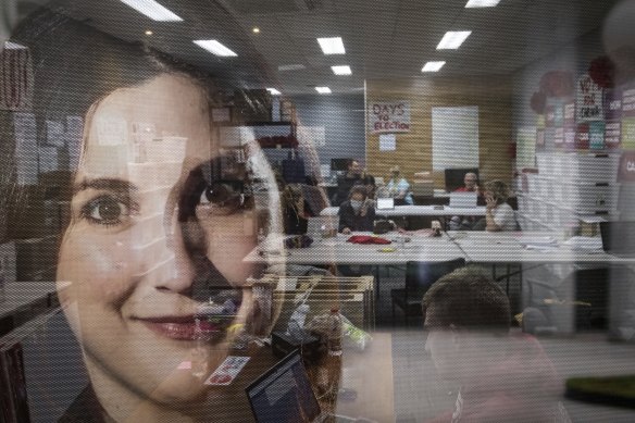Carina Garland (foreground) is Labor’s candidate for Chisholm. Inside her office on Wednesday night, volunteers were making calls to voters in the seat.