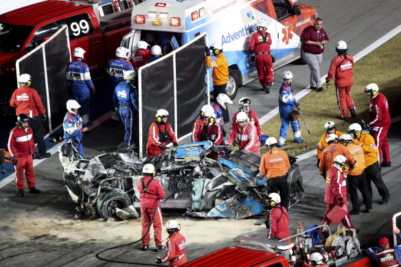 Ryan Newman is removed from the wreckage of his car to be taken to hospital after his crash in the Daytona 500.