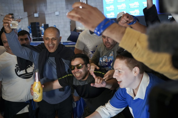 Supporters of Benjamin Netanyahu, former Israeli Prime Minister and the head of Likud party celebrates the first exit poll results for Israel’s election, at the Likud party headquarters in Jerusalem. 