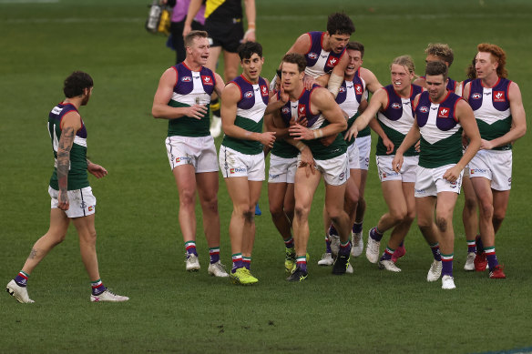 The Dockers celebrate a goal.