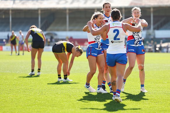 The Bulldogs celebrate their upset win.