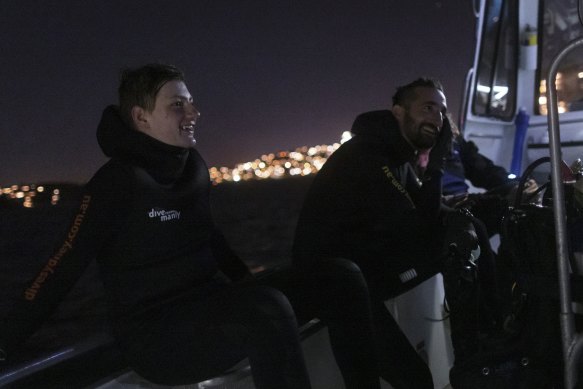 Jed Hawkins and dive instructor Juan after their night dive on Thursday.