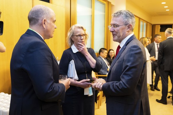 ABC managing director David Anderson, journalist Laura Tingle and Attorney-General Mark Dreyfus  before a meeting with media organisations.