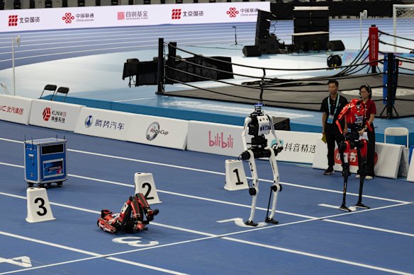 False start: A humanoid falls to the ground before a race can even begin.