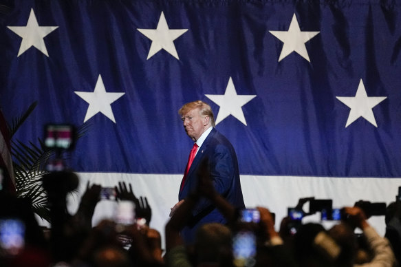 Former president Donald Trump, leaves the stage after speaking at the Georgia Republican convention in June.