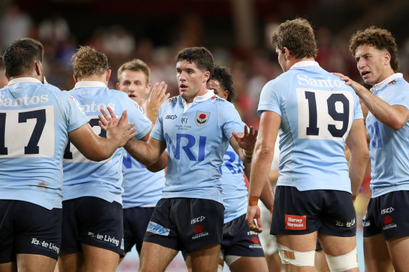 The Waratahs are jubilant after the win.