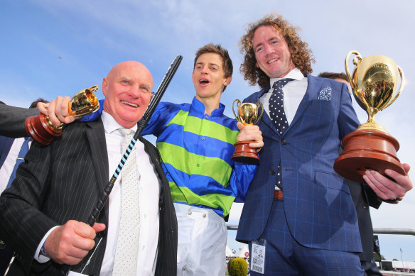 Colin McKenna (left) with jockey Nick Hall and trainer Ciaron Maher after winning the 2016 Caulfield Cup.
